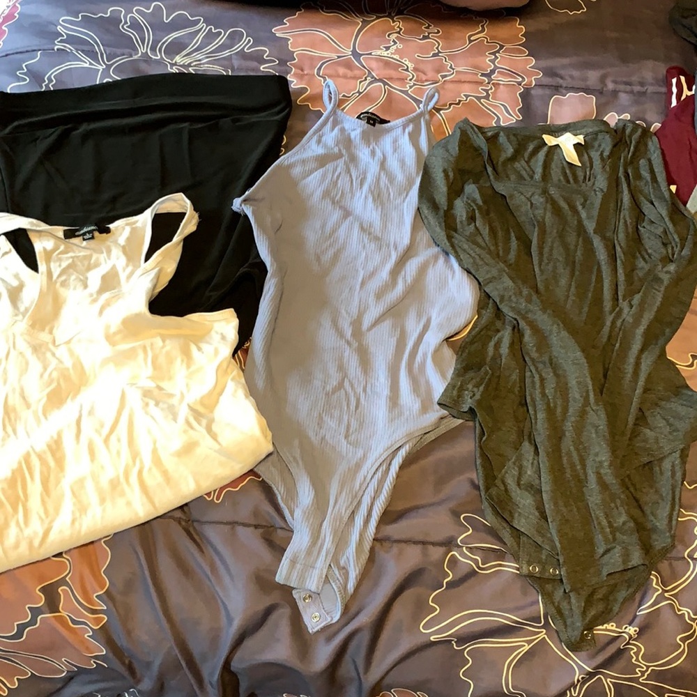 Sold! Four bodysuits. All fit like medium but for shorter torso